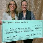 Kat Bryant | Grays Harbor News Group                                Jan Dahl, left, and Dr. Juliette Erickson represented the Cancer Alliance of Grays Harbor at Thursdays event and secured a massive donation.