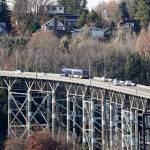 Traffic passes over the 90-year old Magnolia bridge, aging and in need of replacement, Wednesday in Seattle. State and local governments could end up scrambling to pay for road paving and other transportation projects as a Washington state measure that would cut car tabs to $30 was passing in early returns Tuesday. (AP Photo/Elaine Thompson)