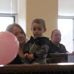 Kasyn waits to be adopted by Steven and Lorna White on Friday during the National Adoption Day ceremony in Judge Stephen Browns courtroom at Grays Harbor County Superior Court in Montesano. (Michael Lang | Grays Harbor News Group)