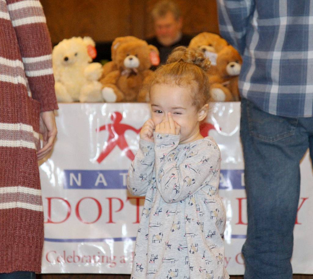 Sawyer Drake tries to contain her excitement about getting a new cousin Friday during the National Adoption Day ceremony in Judge Stephen Browns courtroom at Grays Harbor County Superior Court in Montesano. (Michael Lang | Grays Harbor News Group)
