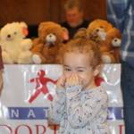Sawyer Drake tries to contain her excitement about getting a new cousin Friday during the National Adoption Day ceremony in Judge Stephen Browns courtroom at Grays Harbor County Superior Court in Montesano. (Michael Lang | Grays Harbor News Group)