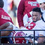 Tua Tagovailoa (13) of the Alabama Crimson Tide is helped off the field after being injured on a play in the first half against the Mississippi State Bulldogs on Saturday, Nov. 16, 2019 at Davis Wade Stadium in Starkville, Miss. (Wesley Hitt/Getty Images/TNS)