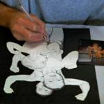 Jared, whose medium is pen and ink, was working on this drawing based on an old photograph of himself with two of his brothers as children. I started this after the middle one died a couple years ago, he said. Im probably going to give it to the fourth little brother, whos not in the picture, to hold onto until I get out.