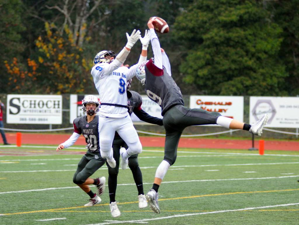 Montesano defender Braden Dohrmann, right, deflects a pass intended for Deer Park receiver Dylan Hall during Montesanos 20-17 loss in a 1A State Tournament quarterfinal game on Saturday at Jack Rottle Field in Montesano. (Ryan Sparks | Grays Harbor News Group)