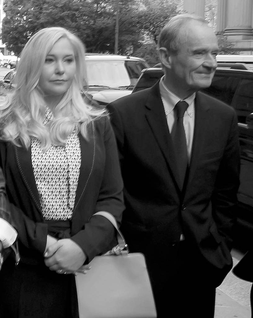 Emily Michot/Miami Herald                                 Attorney David Boies walks with Virginia Roberts Giuffre, who alleges that in 2001, when she was 17 years old, she was coerced into sleeping with Andrew after Jeffrey Epstein groomed her to be a sex slave.