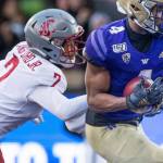 Washington Huskies wide receiver Terrell Bynum (4) hauls in a touchdown pass in the end zone as the Washington State University Cougars - the University of Washington Huskies in the 112th Apple Cup at Husky Stadium on Friday, Nov. 29, 2019 in Seattle, Wash. (Andy Bronson / The Herald)