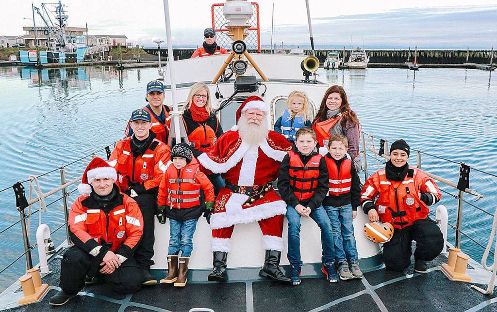 COURTESY PHOTO                                Santa will arrive at Westports Santa by the Sea celebration Saturday via Coast Guard vessel at Float 6 in the Westport Marina before making his way to the museums lens hall to meet with the kids.