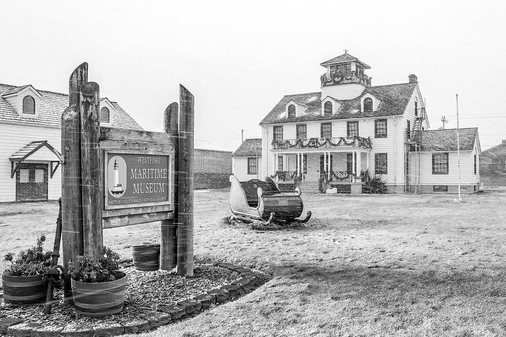 COURTESY PHOTO                                Santas sleigh parked in front of the Westport Maritime Museum amid a light dusting of snow.