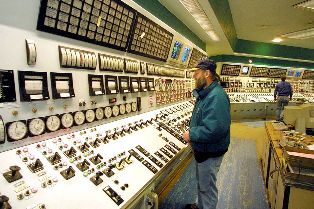 Greg Gilbert/Seattle Times                                  Control-room operator Perry Farmer checks controls at the No. 1 generator at the states only coal-fired steam plant, in Centralia. Plant owner TransAlta reached a deal with the state to shut down the plant. One burner will go cold in 2020 and the other by 2025.