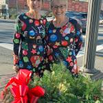 Kat Bryant | Grays Harbor News Group                                Bette Worth, left, and Bobbi McCracken are dressing up downtown Aberdeen for Winterfest.