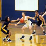 Aberdeens Dylan Richie (4) defends while Forks Tony Hernandez-Flores makes a pass during Fridays game at Aberdeen High School. (Ryan Sparks | Grays Harbor News Group)