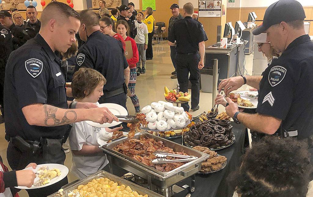 COURTESY HOQUIAM POLICE DEPARTMENT                                Shop with a Cop participants were treated to a huge breakfast at Aberdeen High School Saturday morning presented by the schools culinary class.
