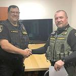 COURTESY PACIFIC COUNTY SHERIFFS OFFICE                                Pacific County Sheriff Robin Souvenir, right, and new Pacific County E911 Director Ed Heffernan.