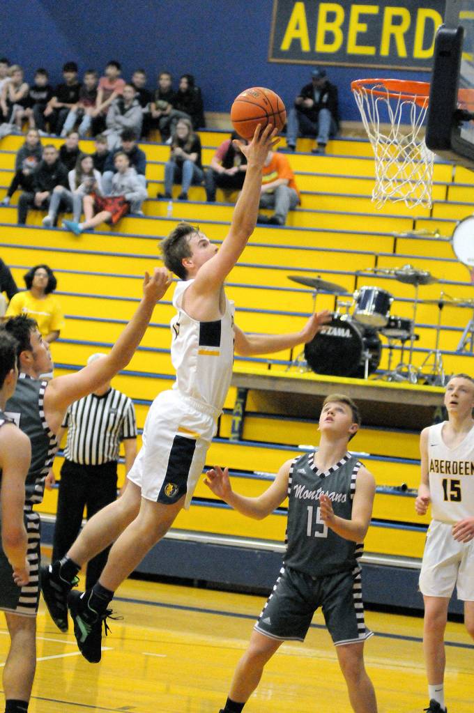 Aberdeens Nick Farrer scores on a drive in the second half against Montesano on Friday at Aberdeen High School. Farrer scored 13 points to lead the Bobcats. (Ryan Sparks | Grays Harbor News Group)