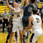 Montesanos Trace Ridgway (10) puts up a shot against Aberdeens Kayden Seibert (15) during the Bulldogs 49-36 victory on Friday in Aberdeen. Ridgway scored a game-high 20 points to lead all scorers. (Ryan Sparks | Grays Harbor News Group)