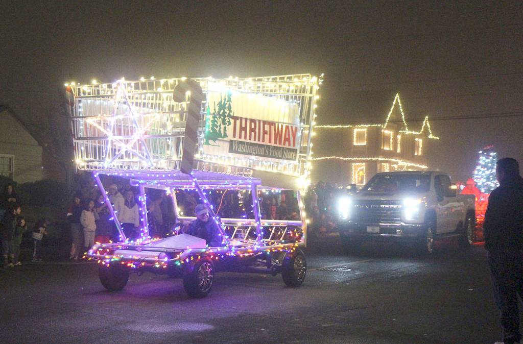 Thriftways giant lighted shopping cart always brightens faces during the annual parade.