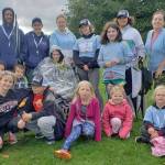 Courtesy photos                                This contingent of Grays Harbor Differently Abled Families participated in the 2019 ALS Walk in Seattle. Standing at far left is the groups founder, Sarah Worthington. At the center, wrapped in a blanket and rain poncho, is Edna Langton, whose battle with ALS (commonly known as Lou Gehrigs Disease) ended Dec. 1 at age 60.