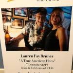Photo courtesy Teri Mann Whyatt                                A sign at Smiths Union Bar in Honolulu includes a picture of Lauren Bruner and Teri Mann Whyatt when they met in 2016.