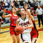 Raymonds Kyra Gardner drives to the basket against Life Christian Academy on Thursday in Raymond. Gardner recorded a triple-double with 25 points, 11 rebounds and 10 steals. (Photo by Larry Bale)