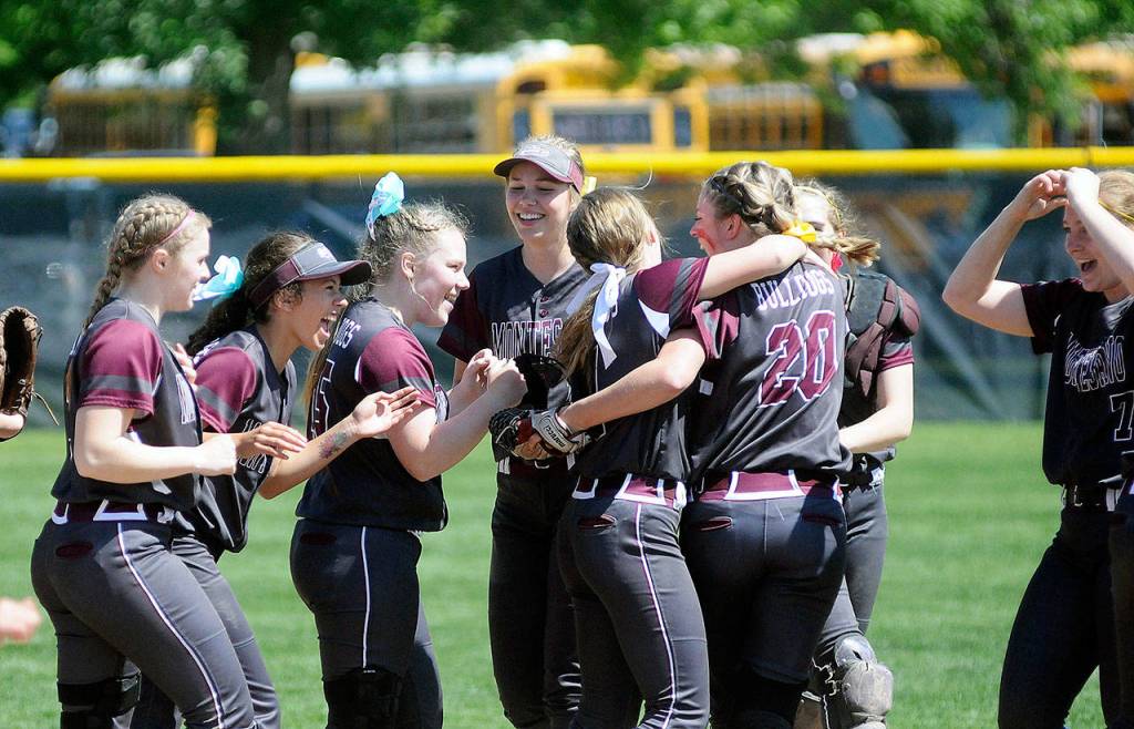 Montesanos girls softball team celebrates after defeating Elma in the 1A state semifinals in May. Monte would go on to win its 10th state championship in program history. (File photo)
