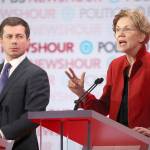 Sen. Elizabeth Warren speaks as South Bend, Indiana Mayor Pete Buttigieg listens during the Democratic presidential primary debate at Loyola Marymount University on Dec. 19 in Los Angeles. Buttigieg was met with criticism during the debate for holding a fundraiser with in a billionaires wine cave. (Justin Sullivan/Getty Images)