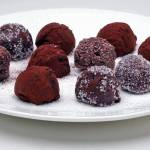 Roll the truffles in the coating of your choice, such as cocoa powder, granulated sugar, sprinkles or nuts.