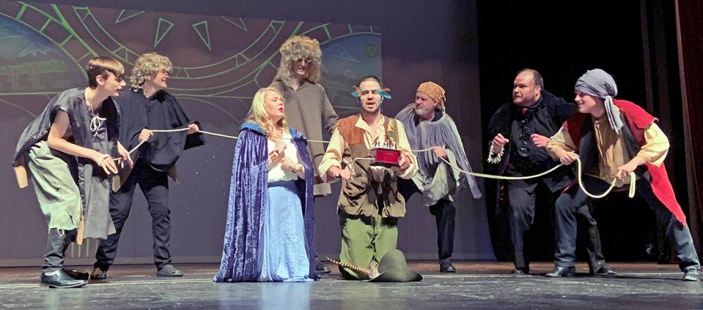 Monostatos (Matthew Kline, second from right) and his thugs try to capture Pamina (Danielle Tobin) and Papageno (Jerrod Phelps).