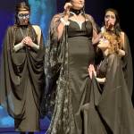 The Three Ladies (Alexandra Koski, Jasmin Torres and and Emma Dorsch) gather around the Queen of the Night (Analei Holt, center).