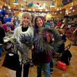 Pat Neve and Laurie Bowman show off their lavender creations at the 
Dec. 6 event at the museum.