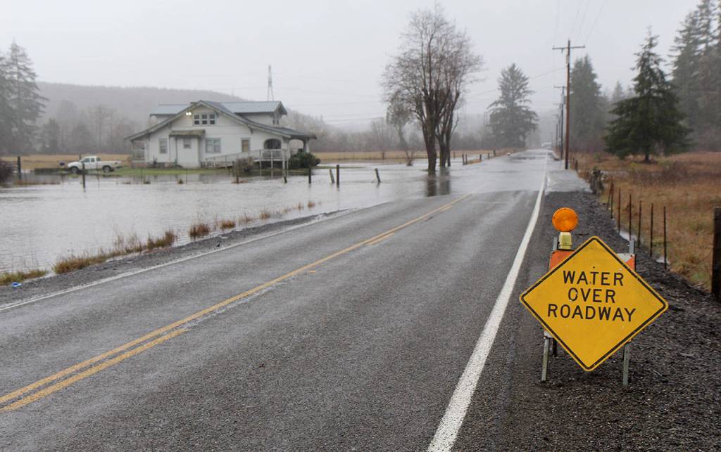 A house is surrounded by floodwaters Tuesday along the Mox-Chehalis Road near Porter. Grays Harbor Emergency Management advises drivers to turn around when they see water over a roadway. The National Weather Service in Seattle issued a flood warning for the Chehalis River on Tuesday morning. (Michael Lang | Grays Harbor News Group)