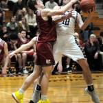 Montesanos Trace Ridgway (10) attempts a shot while Hoquiams Cameron Bumstead looks to make a block during Tuesdays game in Montesano. (Ryan Sparks | Grays Harbor News Group)