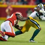 Kansas City Chiefs linebacker Anthony Hitchens, left, attempts to pull down Green Bay Packers running back Aaron Jones in the first quarter at Arrowhead Stadium in Kansas City, Mo., on Sunday, Oct. 27, 2019. (James Wooldridge/Kansas City Star/TNS)
