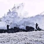 Many people turned out to photograph the sea foam that was forming in Ocean Shores. (Photo by Scott D. Johnston)