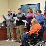 DAN HAMMOCK | GRAYS HARBOR NEWS GROUP                                Re-elected and newly-elected Hoquiam City Council members were sworn in prior to Mondays council meeting. From left: Steven Puvogel, Ward 2; new Ward 4 Councilman Al Dick; Dave Hinchen, Ward 6; Shannon Patterson, Ward 3; Brenda Carlstrom, Ward 5; Elizabeth Reid, Ward 6; and Dave Wilson, Ward 1.