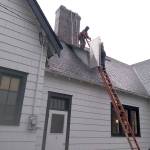 Workers recently stabilized the chimney at the new home of the McCleary Historical Society. The former home of the United Methodist Church was damaged in the 2001 Nisqually Earthquake. The bricks of the chimney were encased and stabilized, and a chimney topper was added to keep the rain out. It is now a solid chimney and should last a long time, columnist Linda Thompson, who is a leader of the historical society, reported.                                Photo courtesy Linda Thompson