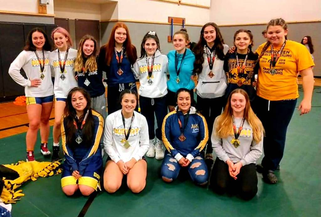 Aberdeens girls wrestling team pose for a photo after taking first place at the River Ridge Rumble on Saturday in Napavine. (Submitted photo)