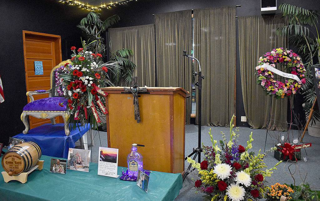 Photos by DAN HAMMOCK | GRAYS HARBOR NEWS GROUP                                Photos, flowers and memories were displayed on the stage at the Montesano Moose Lodge on Friday as the venue hosted the celebration of life for Chuck Caldwell.
