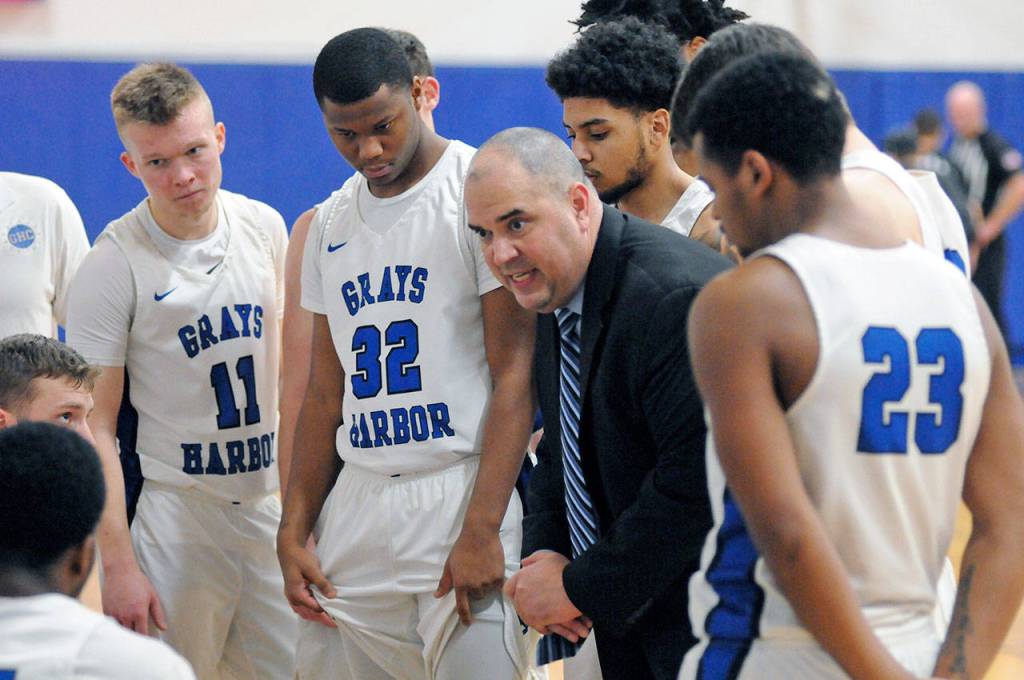Ryan Sparks | Grays Harbor News Group                                 Grays Harbor College mens basketball coach Matt Vargas instructs his team during a timeout in the second half of a game against South Puget Sound on Saturday in Aberdeen.