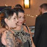 DAN HAMMOCK | GRAYS HARBOR NEWS GROUP                                Black and White Gala attendees check out the 12 live auction items Saturday up for bid at the annual United Way of Grays Harbor fundraiser.