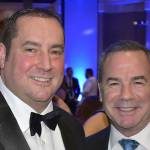 DAN HAMMOCK | GRAYS HARBOR NEWS GROUP                                Rich Hartman of Five Star Dealerships, left, is a founding sponsor of the United Way Black and White Gala fundraiser. Paul Silvi, KING 5 sports anchor and the voice of Five Stars radio ads, attends the fundraiser annually.