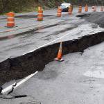 DAN HAMMOCK | GRAYS HARBOR NEWS GROUP                                Highway 101 on Cosi Hill has been down to one lane since this slide Jan. 24. The pavement has settled and cracked significantly since the initial slide. Department of Transportation crews have set up one-way alternating traffic at the slide, at milepost 78.8. There is no time frame for repair.