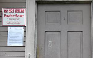 DAN HAMMOCK | GRAYS HARBOR NEWS GROUP                                 The sign on a house in the 300 block of Eklund Avenue shows the home has been condemned by the City of Hoquiam. Its one of two chronic nuisance properties the city condemned Jan. 28.