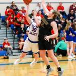 Willapa Valleys Cami Swartz (30) puts up a shot against Ilwacos Kylie Gray during the Vikings 53-31 loss on Monday in Menlo. (Photo by Larry Bale)