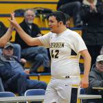 Aberdeens Noble Hyde gets a high five as he heads to the bench during the second half of the Bobcats 61-49 win over Centralia on Tuesday in Aberdeen. Hyde scored four points in his first varsity game after having been the team manager the past four seasons. (Ryan Sparks | Grays Harbor News Group)