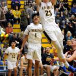 Aberdeens Wyatt Johnson throws down a slam dunk while teammate Angel Baltazar (1) looks on during the third quarter of Aberdeens 61-49 victory on Tuesday at Sam Benn Gym in Aberdeen. (Ryan Sparks | Grays Harbor News Group)