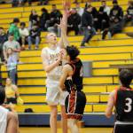 Aberdeens Kayden Seibert puts up a shot against Centralias Jason Baum during the Bobcats 61-49 victory on Tuesday in Aberdeen. (Ryan Sparks | Grays Harbor News Group)