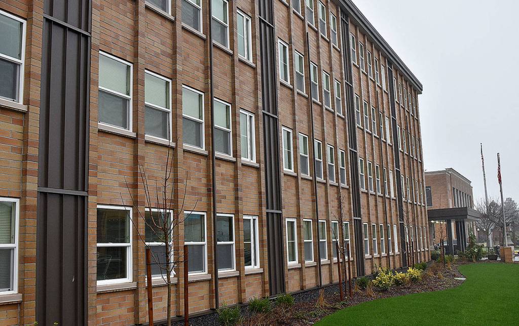 DAN HAMMOCK | GRAYS HARBOR NEWS GROUP                                 The 8th Street side of Hoquiam Manor shows new, energy efficient windows and new landscaping, some of the affordable housing complexs recently completed improvements. City Hall is in the background.