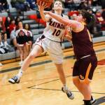 Raymond guard Alia Enlow (10) is defended by South Bends Alise Rohr during the Seagulls 59-20 victory on Wednesday in Raymond. (Photo by Larry Bale)