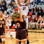 Raymonds Kyra Gardner (21) puts up a shot against South Bends Elli Capps during Raymonds 59-20 win on Wednesday at Raymond High School. Gardner led all scorers with 22 points. (Photo by Larry Bale)