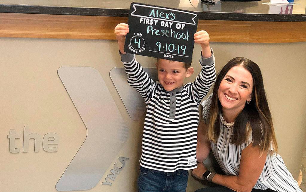 COURTESY YMCA OF GRAYS HARBOR                                 YMCA of Grays Harbor CEO/Executive Director Franzine Potts with Alex Steele on the first day of preschool classes this past September.